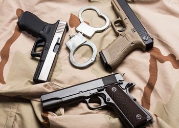 Four Individuals Arrested in Illegal Casino Raid Now Facing Gun-Related Charges